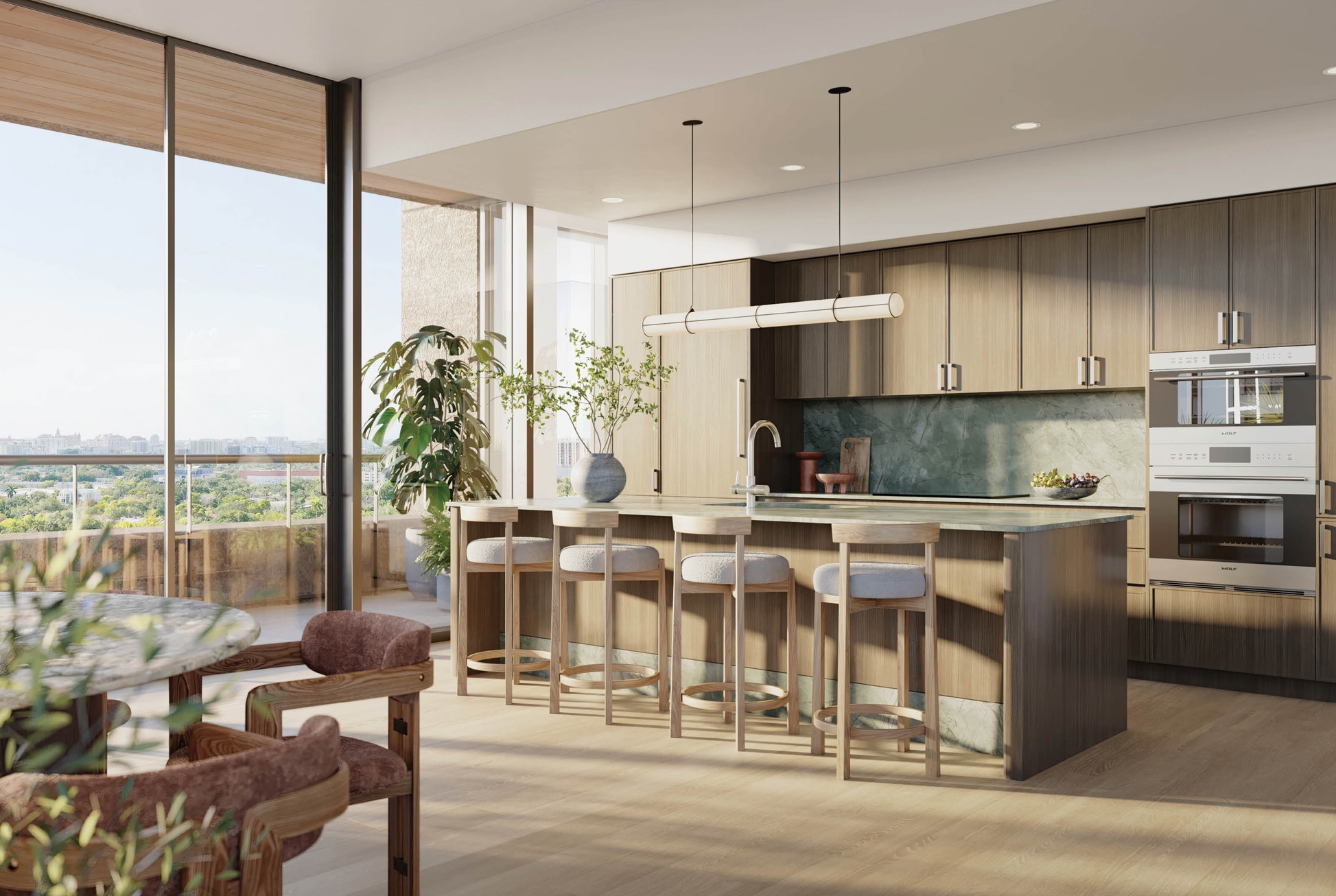 Luxury kitchen and dining area at The WELL Coconut Grove residences in Miami