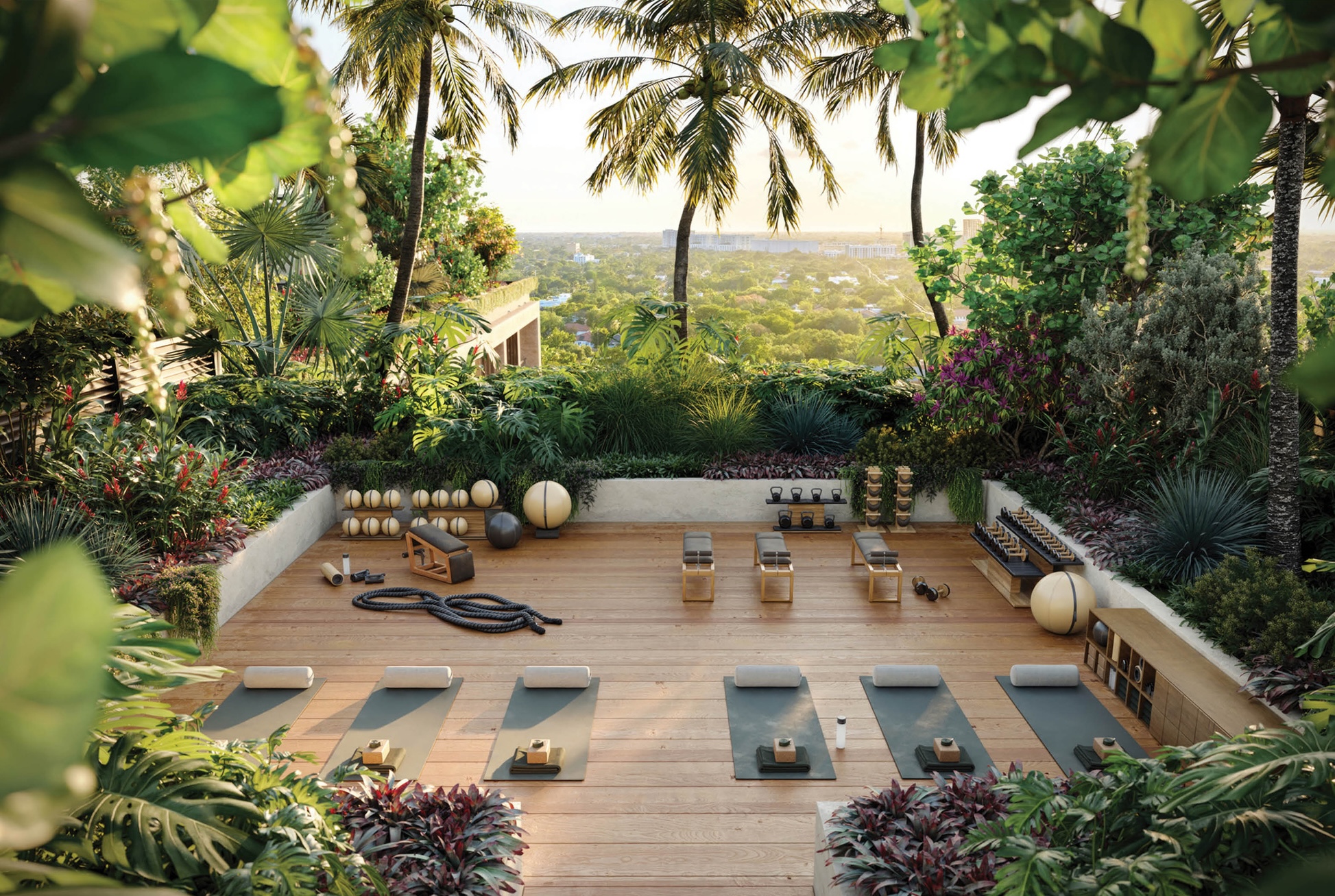 Outdoor wellness fitness terrace at The Well Coconut Grove overlooking the surrounding neighborhood