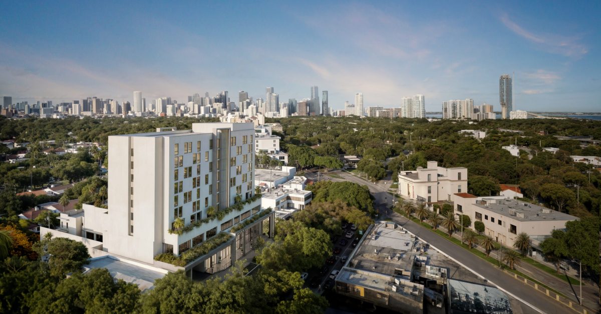 Atelier Residences Miami in The Roads with the Miami skyline in the background